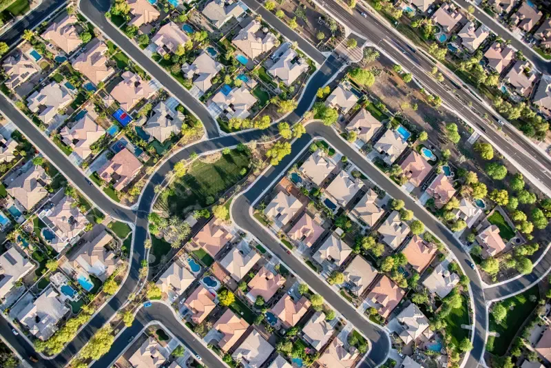 Home seller reviewing a pre-sale building inspection report before listing the property