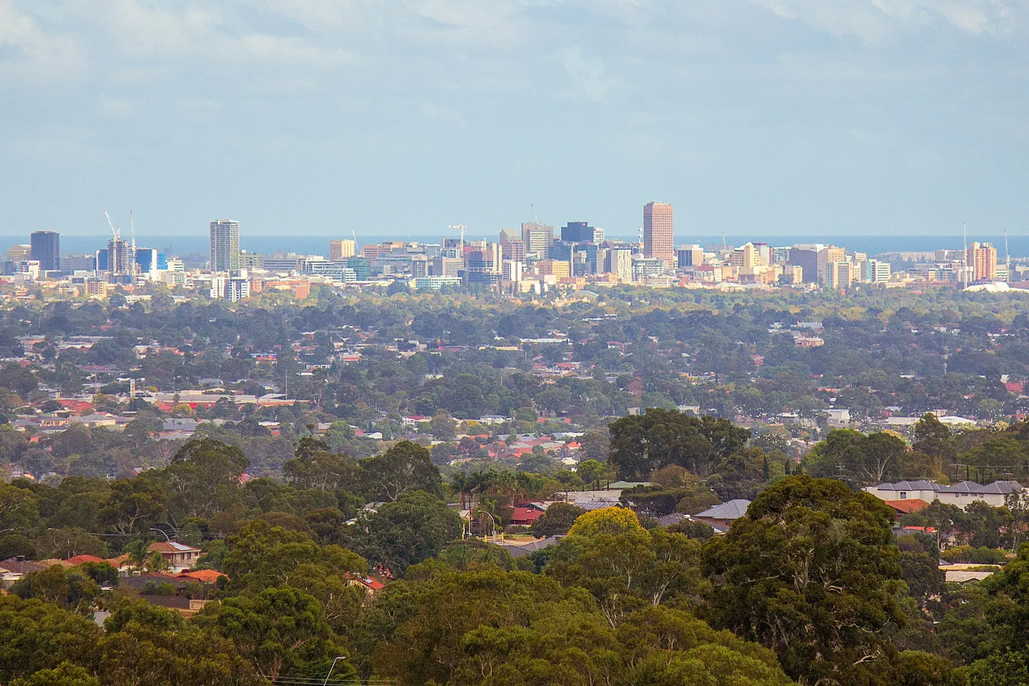 Adelaide city skyline viewed from the Adelaide Hills - building inspections across South Australia