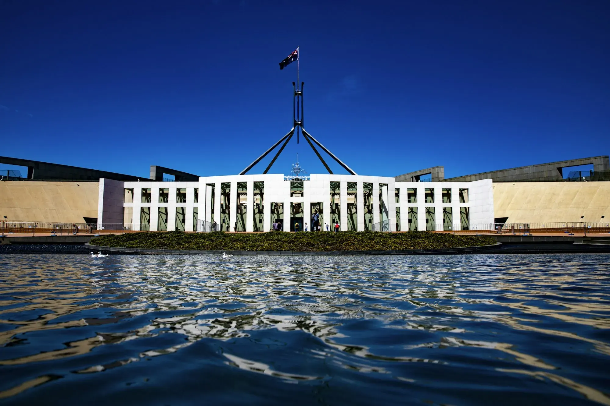Parliament House Canberra with Australian flag - building inspections across the ACT