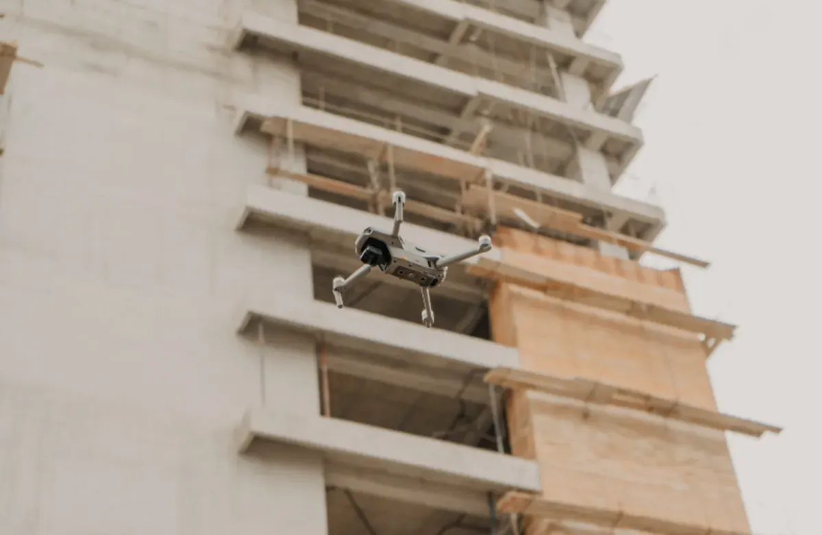 Drone inspecting the exterior facade of a multi-storey building in Australia