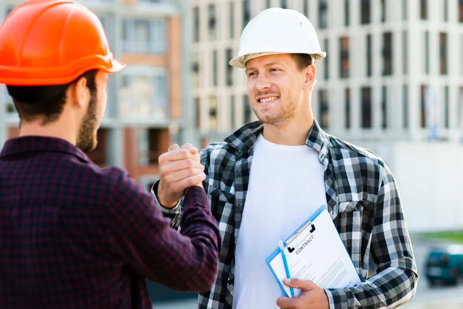 Building inspectors reviewing construction work on site