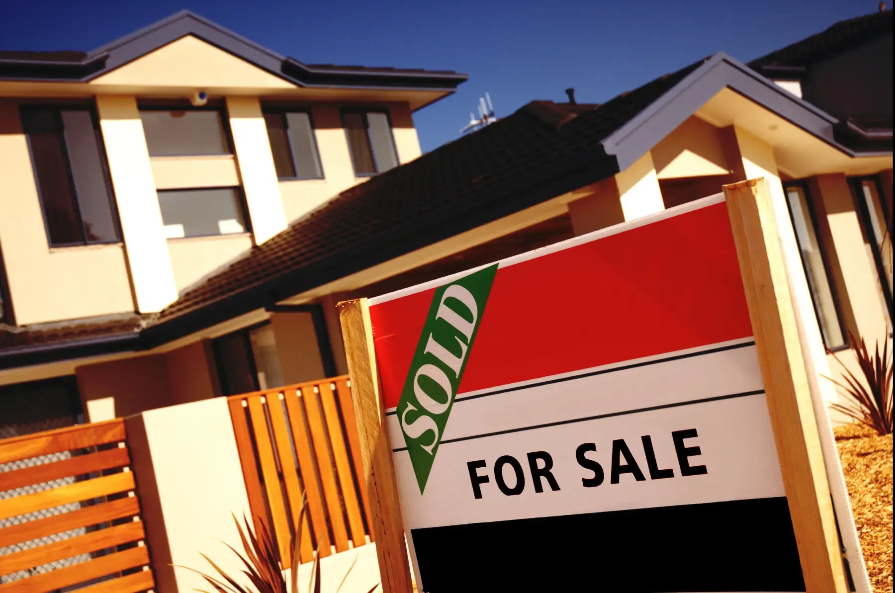 Building inspector reviewing a pre-purchase report with a homebuyer at a property in Australia