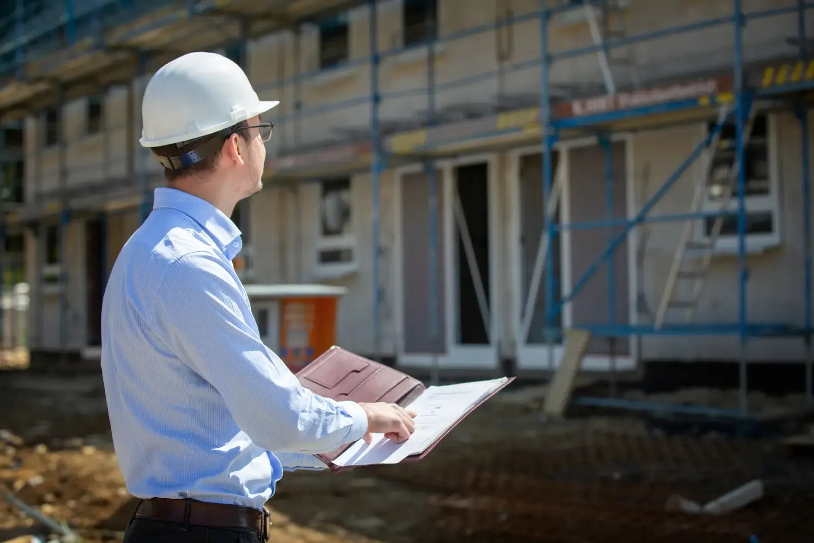 Building inspector reviewing construction quality during a stage inspection in Australia