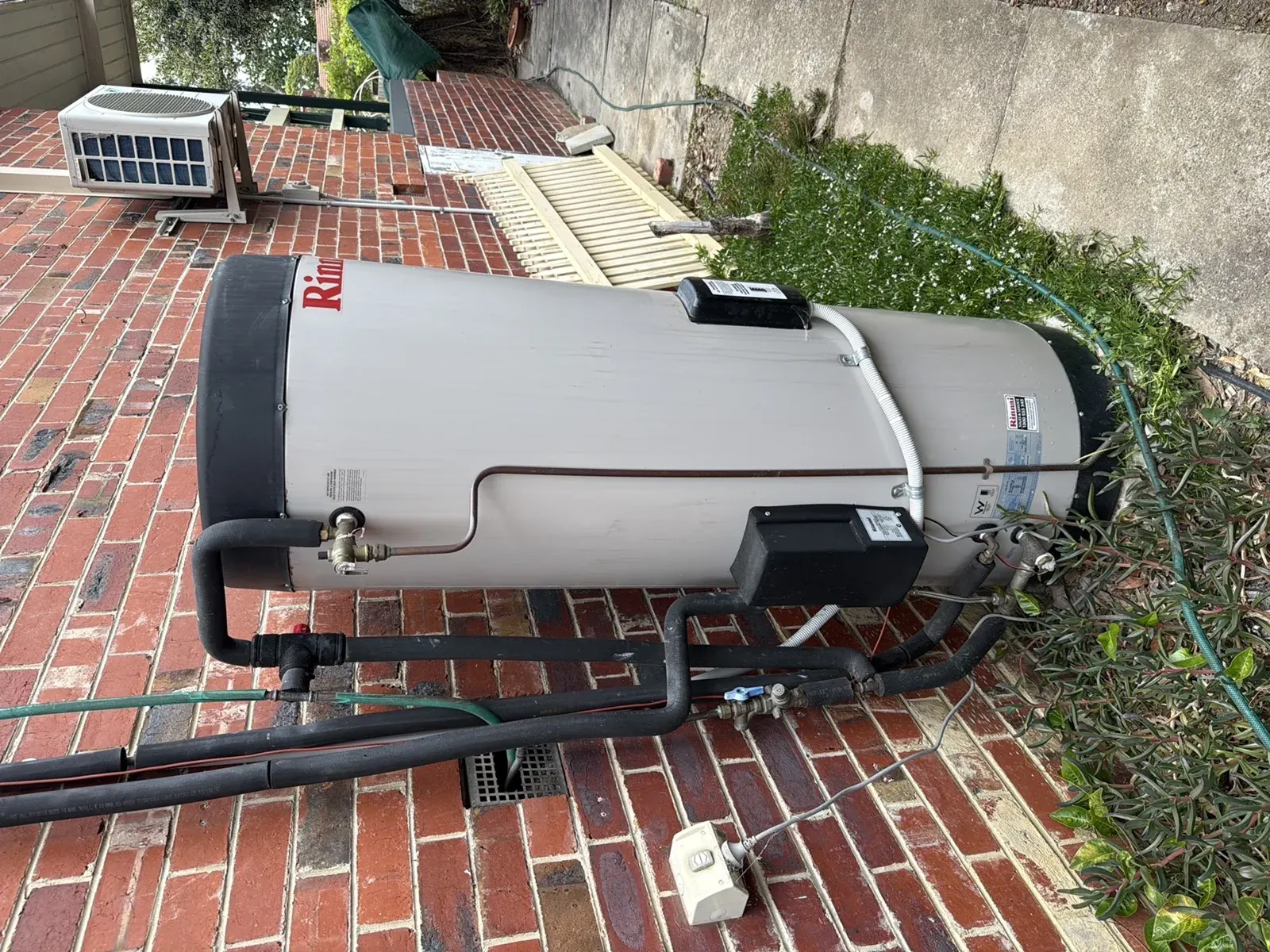 External hot water unit at a rental property