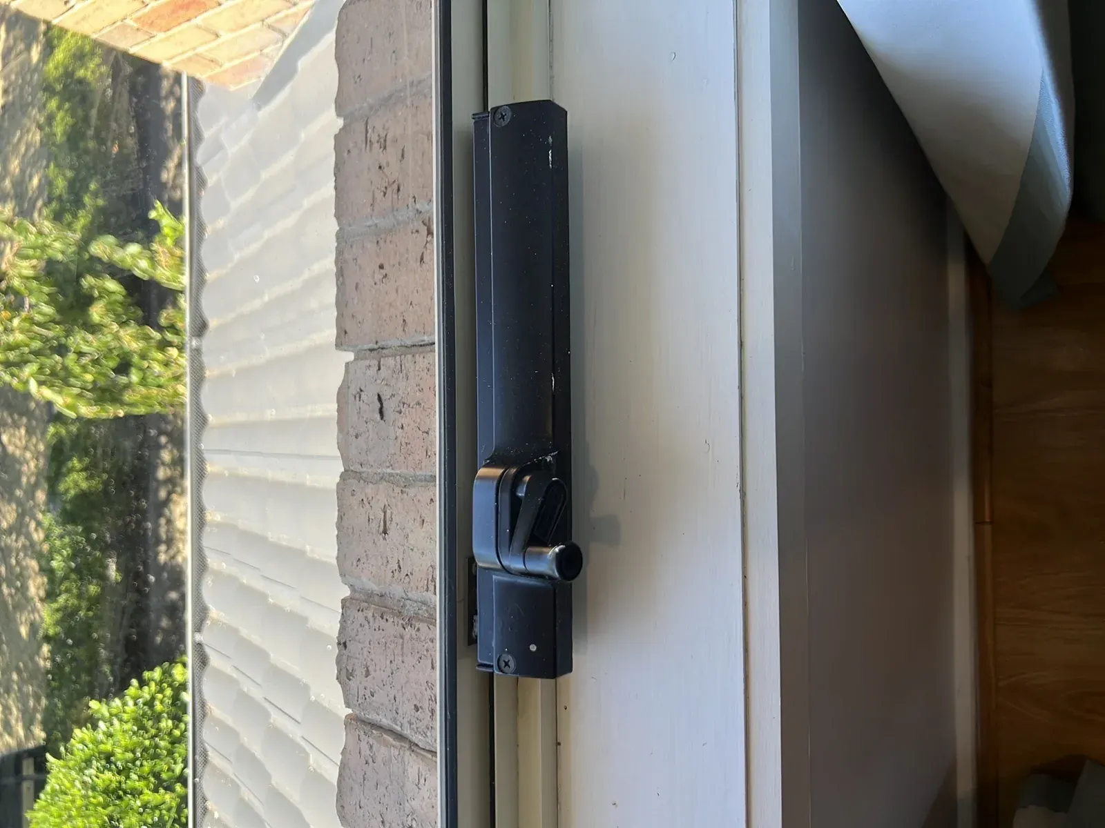 Window latch tested during a rental minimum standards inspection
