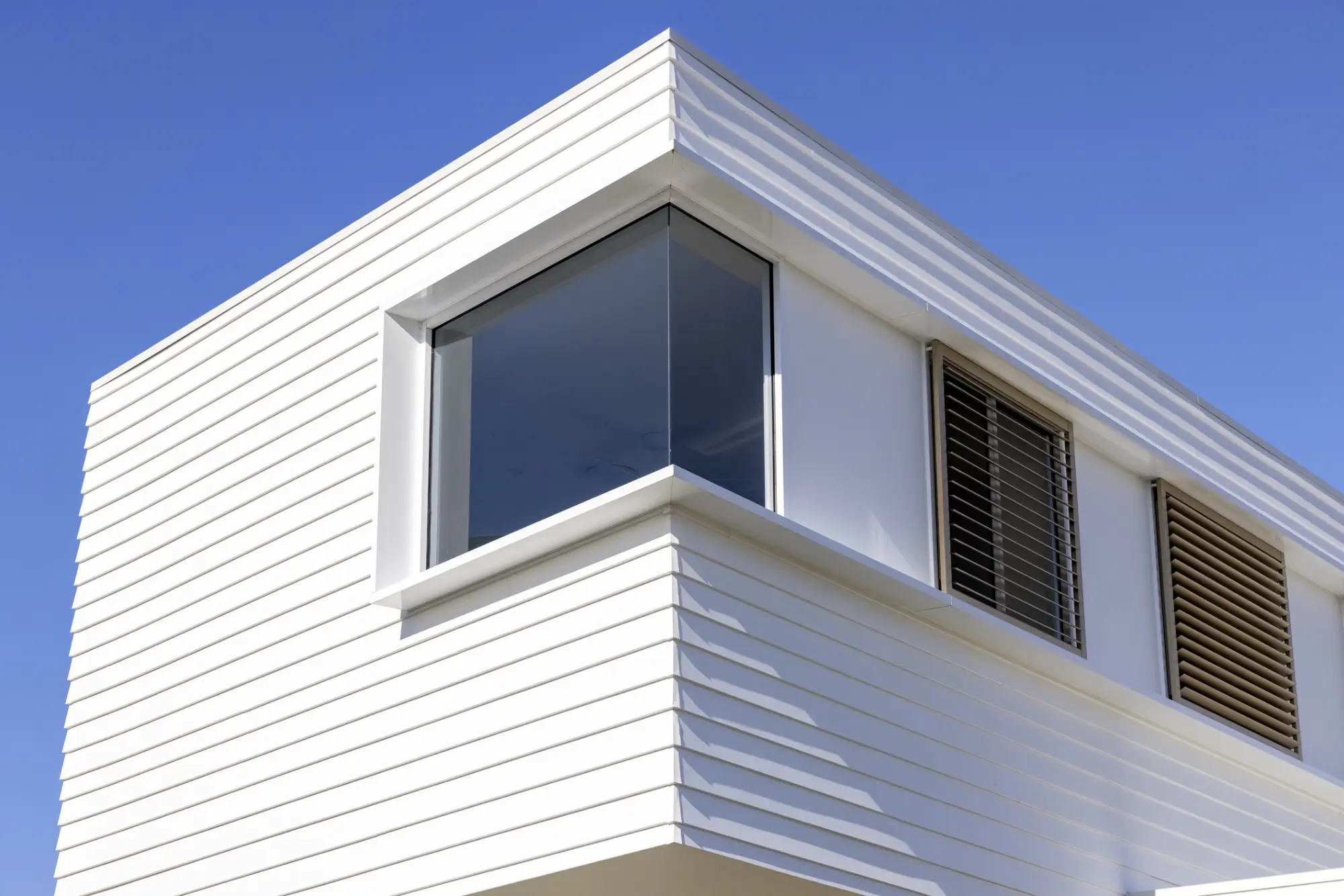 a house with white exterior walls
