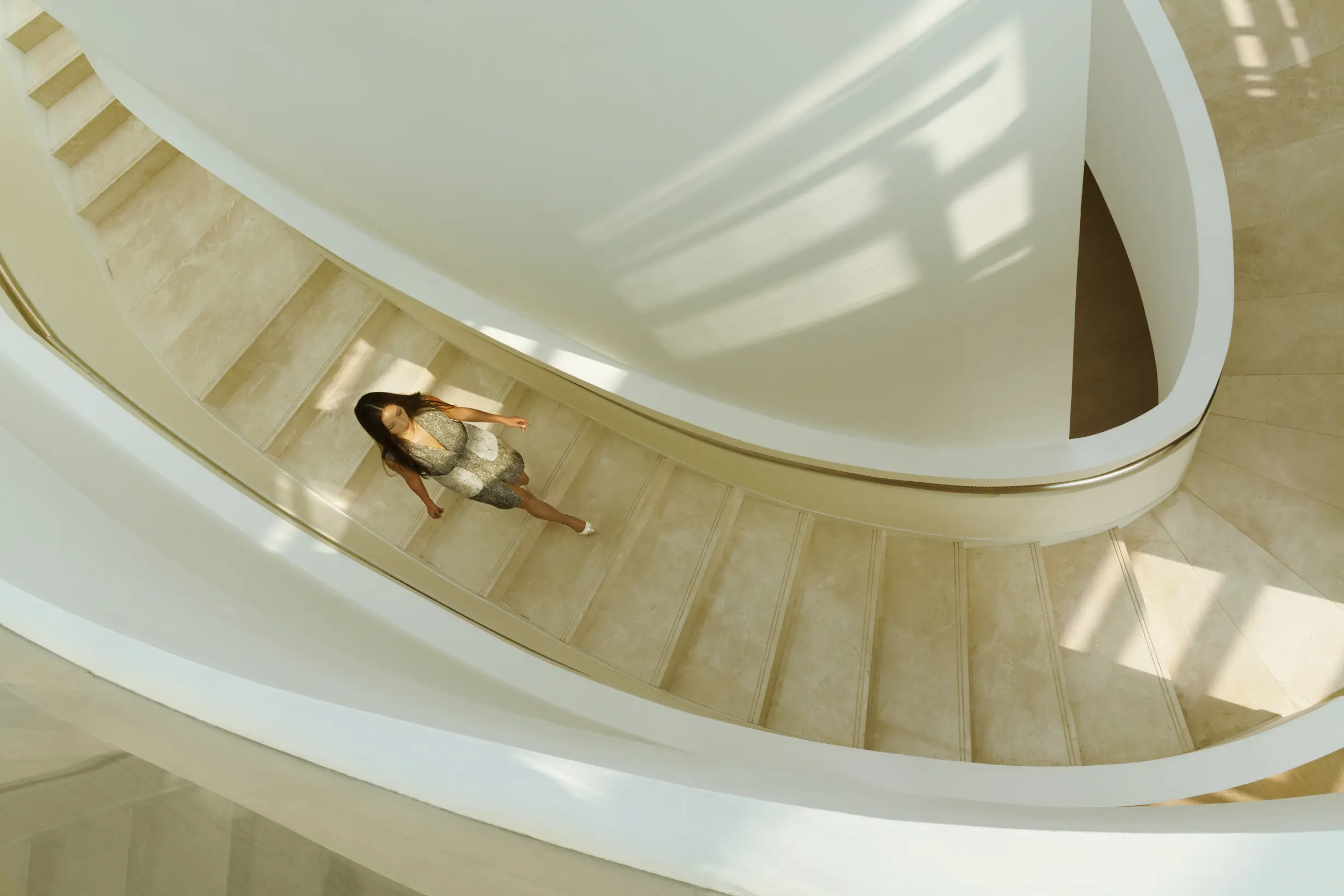 a lady walking down the stairs