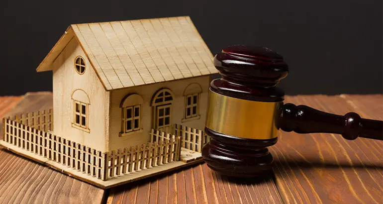 miniature image of a house with a gavel